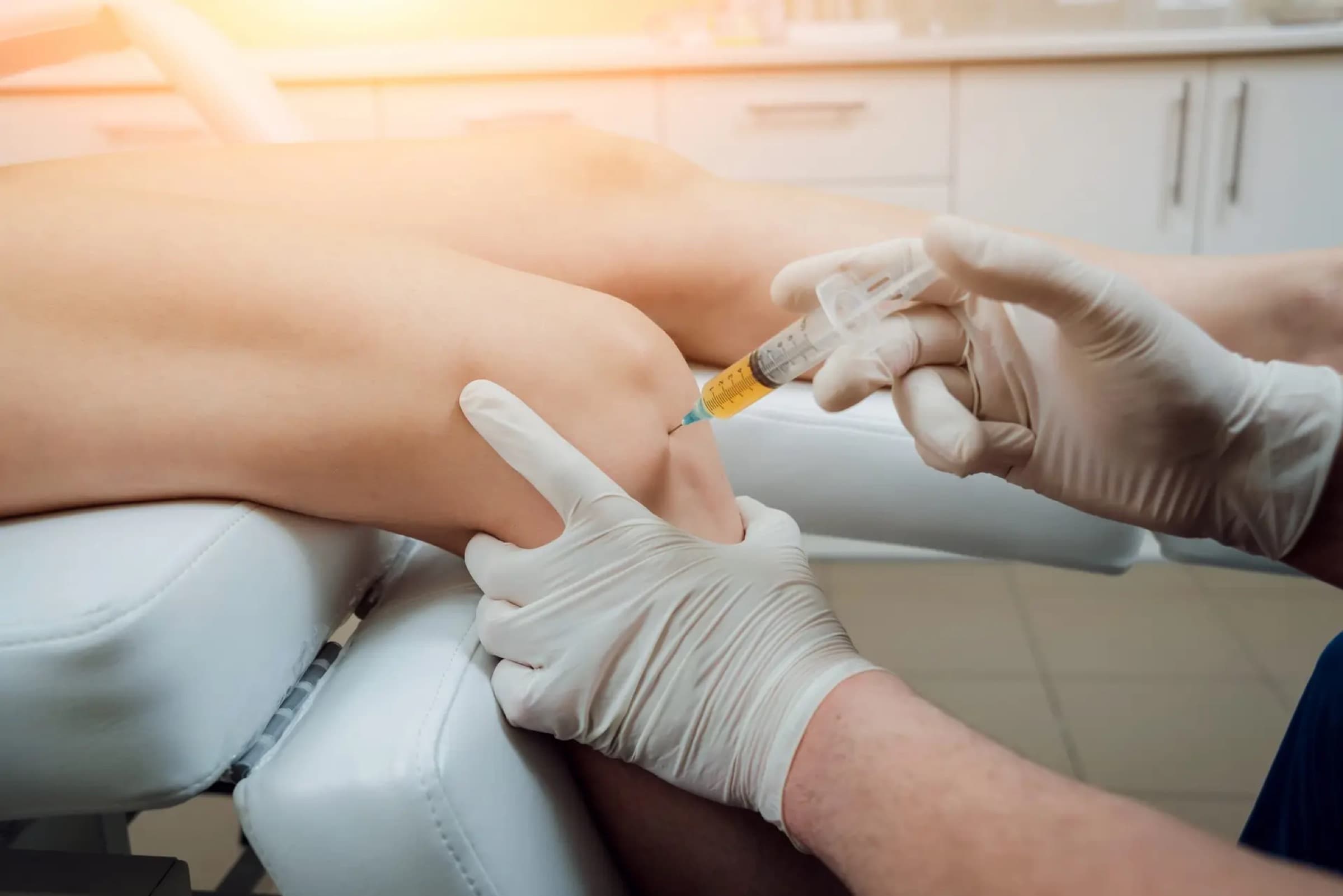 Knee receiving an image-guided injection treatment